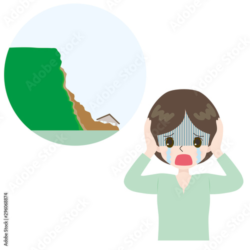 崖崩れ　嘆く女性