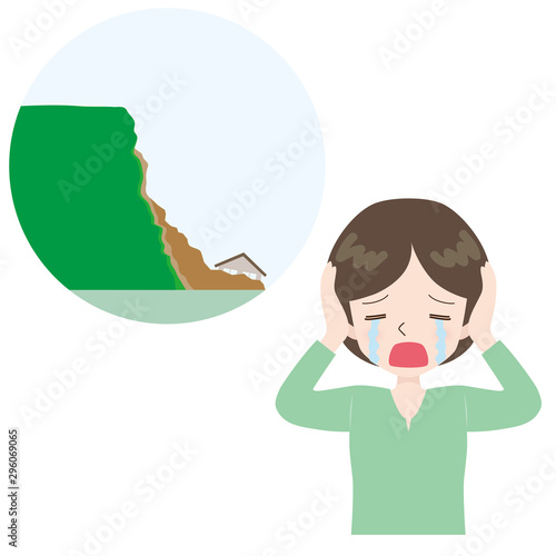 崖崩れ　嘆く女性