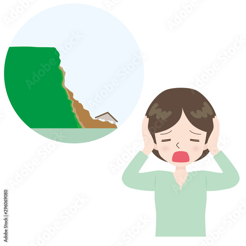 崖崩れ　嘆く女性