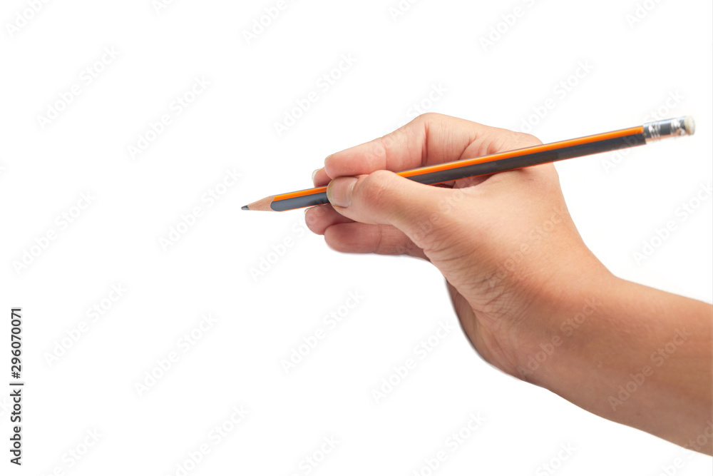 Child hand draws a pencil. Isolated on white background. Blank sheet. Above view. Hand write on a paper with a pencil. Child hand draws a pencil. Isolated on white background. Blank sheet. Above view. Hand write on a paper with a pencil.