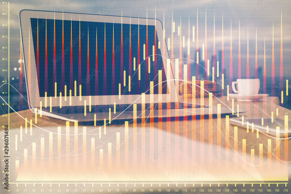 Forex market graph hologram and personal computer on background. Double exposure. Concept of investment. Forex market graph hologram and personal computer on background. Double exposure. Concept of investment.