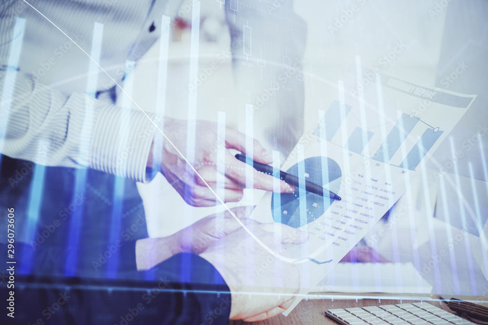 Financial trading graph double exposure with man desktop background. Financial trading graph double exposure with man desktop background.