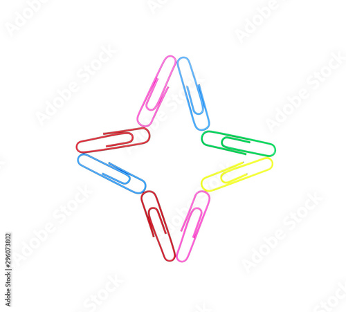 Decorative paper clips in the form of a four-pointed star on a white background