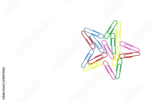 Series of colorful paper clips with star shape on white background. Decorative paper clips in pink, yellow, green, red and blue colors
