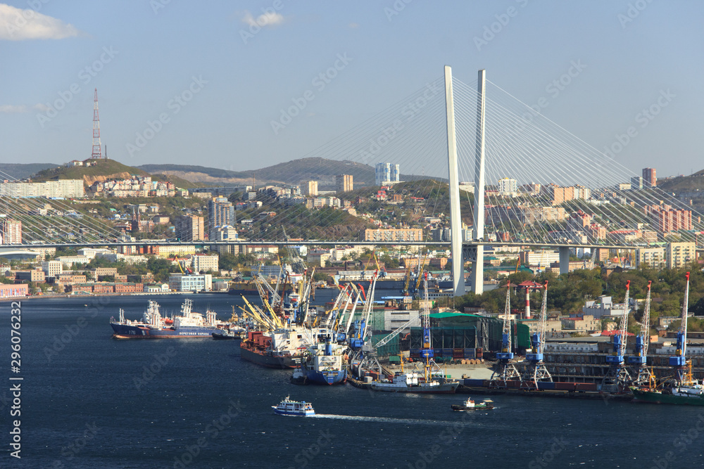 Vladivostok, Russia - October, 5, 2019: Panorama of the port and the city center from a viewing platform at the top of Krestovaya Hill.