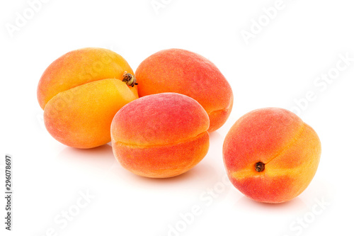 Whole ripe apricots isolated.