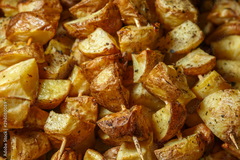 Grilled potatoes on wooden skewers Grilled potatoes on wooden skewers