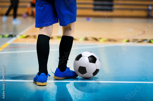 Futsal Junior Player on Indoor Training. Soccer Winter Class at School Indoor Futsal Court. Young Player in an Indoor Play-field
