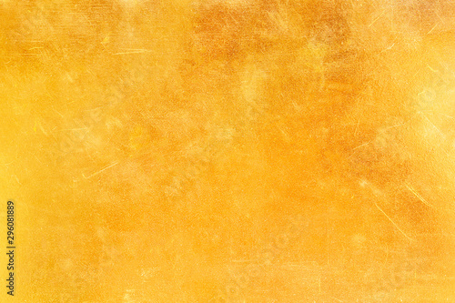 Gold abstract background or texture distress scratch and gradients shadow