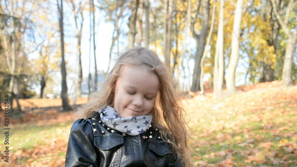 Portrait in the park of a beautiful little five year old girl in the park Portrait in the park of a beautiful little five year old girl in the park