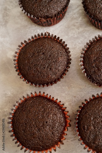 Homemade dark chocolate cupcakes, selective focus