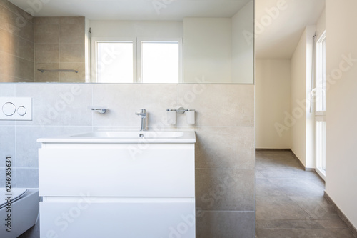 Front view of sink and mirror. Modern bathroom