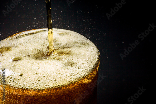 Fizz sparkling Beer bubbles Refreshing . Cold drink froth Beer liquid fresh i...