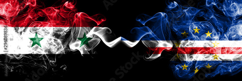 Syria vs Cape Verde smoke flags placed side by side. Thick colored silky smoke flags of Syrian and Cape Verde photo