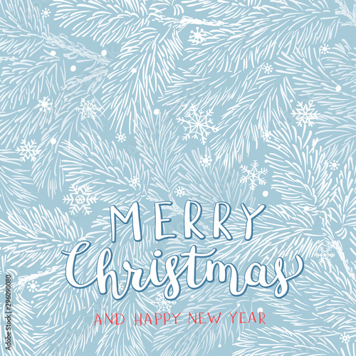 Winter holidays or Christmas background with pine branches and snowflakes.