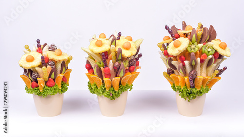 Fotografie Fresh fruit bucket basket healthy lifestyle present with chocolate