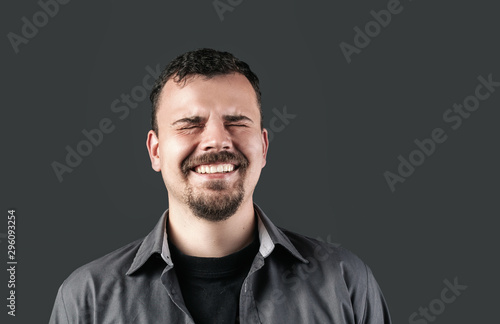 laughing guy with closed eyes