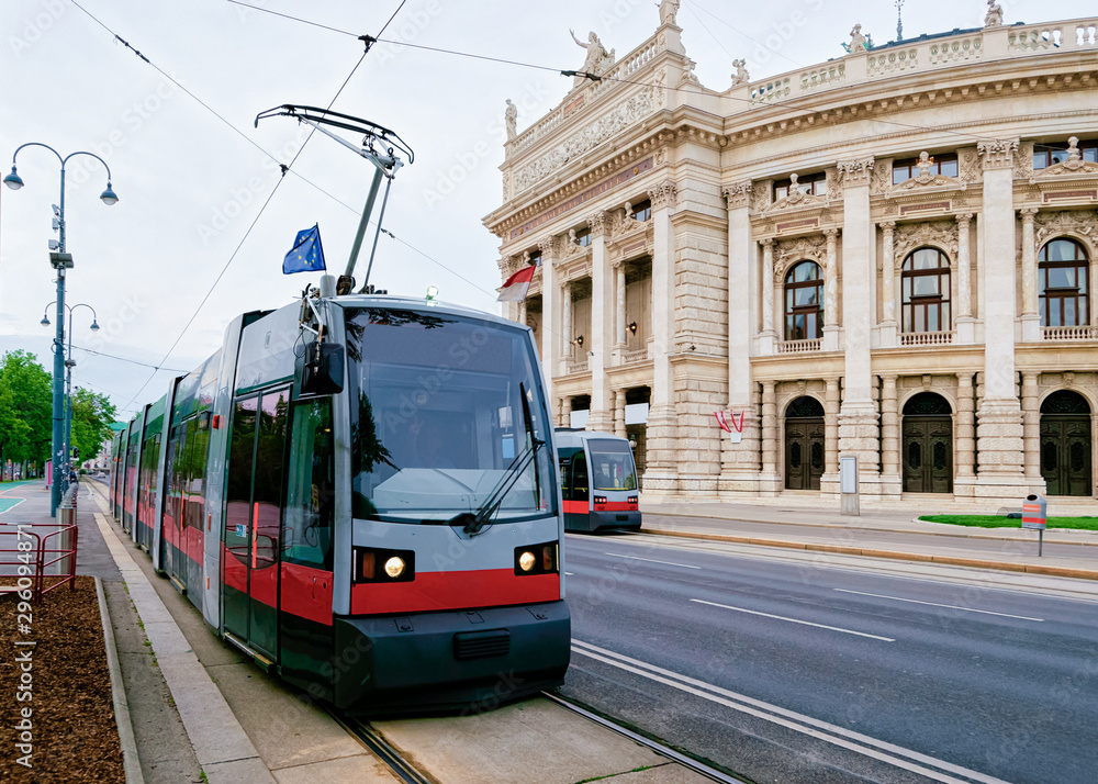 Street view with public tram at Burgtheater in Hofburg Vienna