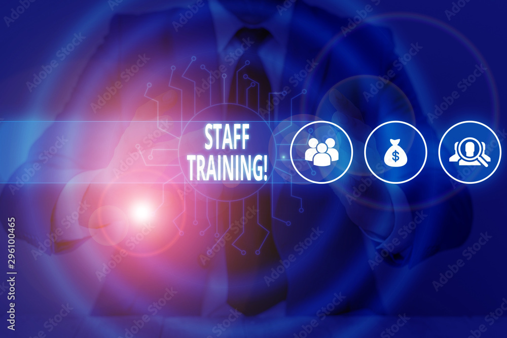 Text sign showing Staff Training. Business photo text learn specific knowledge improve perforanalysisce in current roles Male human wear formal work suit presenting presentation using smart device Text sign showing Staff Training. Business photo text learn specific knowledge improve perforanalysisce in current roles Male human wear formal work suit presenting presentation using smart device