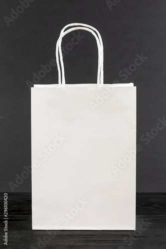 White paper bag on black background