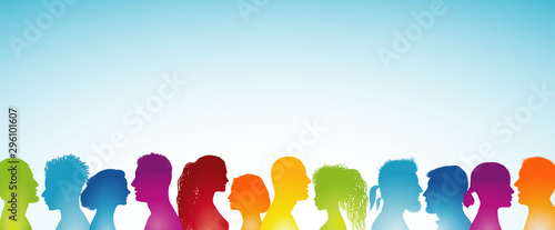 Large group of people isolated silhouette in profile. I talk to many people. Crowd of people. Rainbow colored heads. Population. Communication concept. Social network. Teamwork. Public. Politic