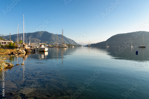 Quiet morning in the harbor of the Ionian Sea, yachts in the amusement, marina where ships are standing, brown yacht, Lefkada Island, Greece