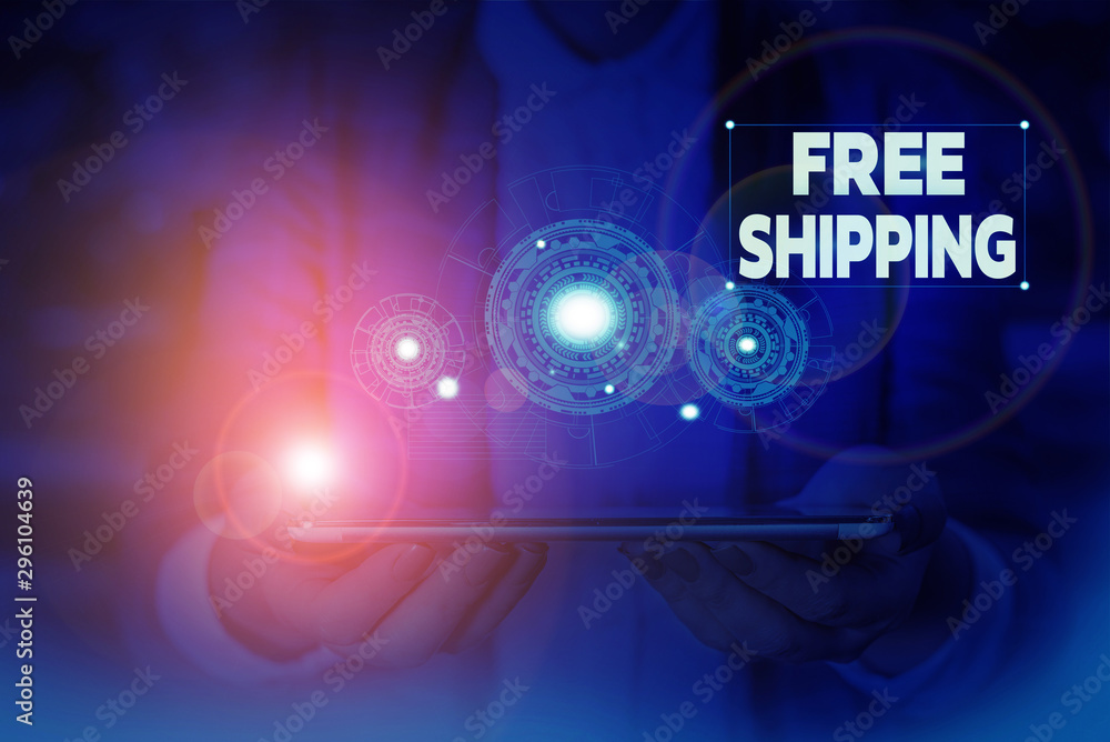 Handwriting text writing Free Shipping. Conceptual photo Freight Cargo Consignment Lading Payload Dispatch Cartage Woman wear formal work suit presenting presentation using smart device Handwriting text writing Free Shipping. Conceptual photo Freight Cargo Consignment Lading Payload Dispatch Cartage Woman wear formal work suit presenting presentation using smart device