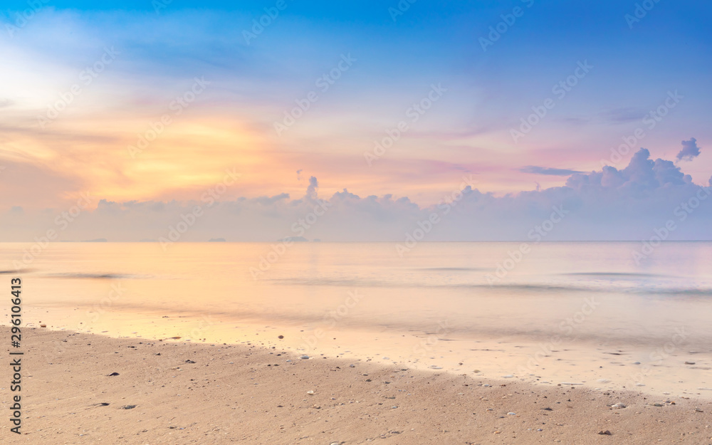 Beautiful colorful sunrise at the calmness beach