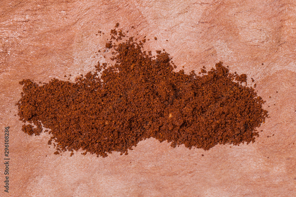 Carob powder on tree bark table. Healthy eating, food background. Carob powder on tree bark table. Healthy eating, food background.