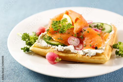waffle with salmon, cheese and vegetables