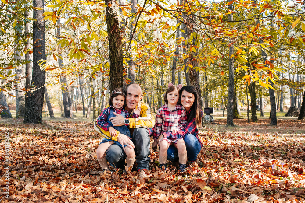 Family at park in autumn Family at park in autumn