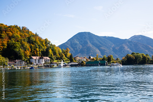 Tegernsee on a sunny autumn day, blue sky, mountains in the background