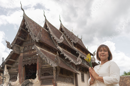 Asian women happiness in Chiang Mai on holiday with North style dressing and Culture.