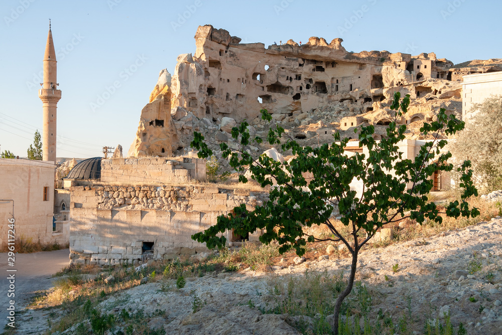 Rock castle and minaret at Göreme, Open air UNESCO world heritage site Museum in Cappadocia, Turkey