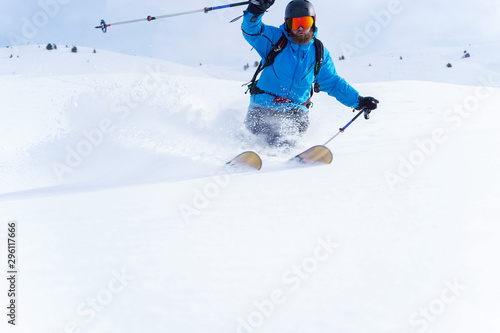 Photo of sporty man wearing ski mask and helmet