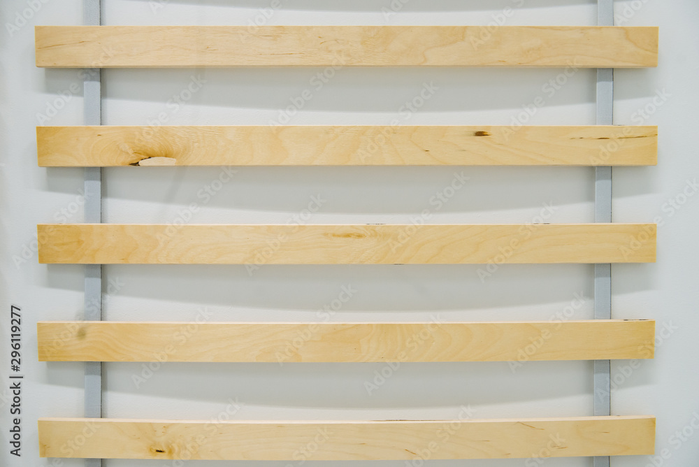 Close up detail of wooden elements double bed slatted mattress base. Close up detail of wooden elements double bed slatted mattress base.