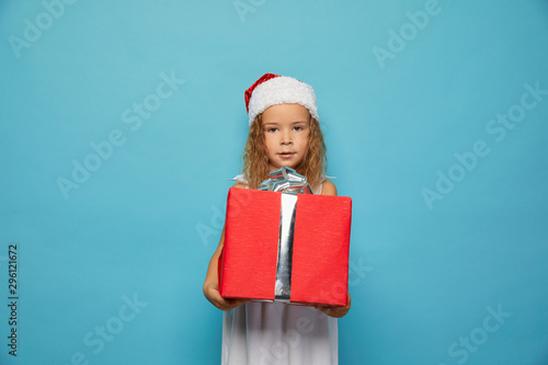 Child in Santa red hat