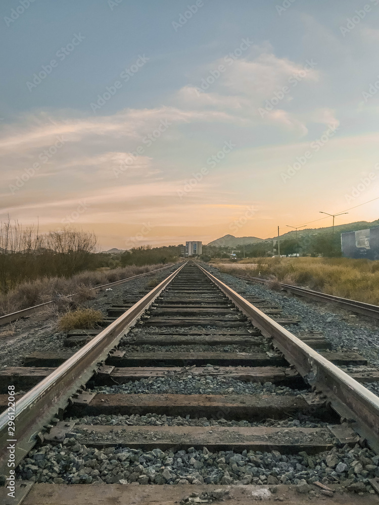 Fototapeta premium Train tracks in a sunny day