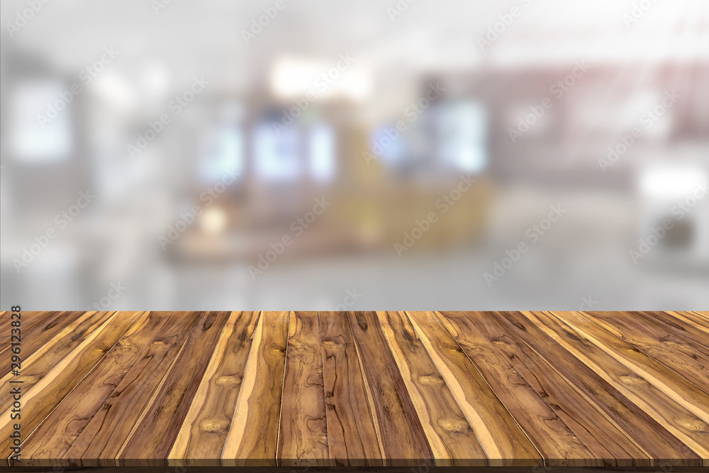 Empty wooden board space platform with counter blur background Empty wooden board space platform with counter blur background