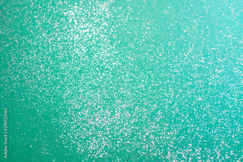 Φωτογραφία Silver glitter on a mint background
