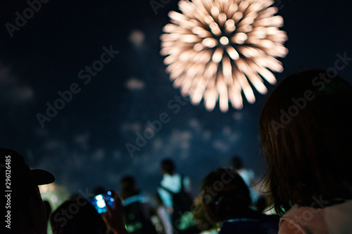 Firework with crowds of people at night in Japan 