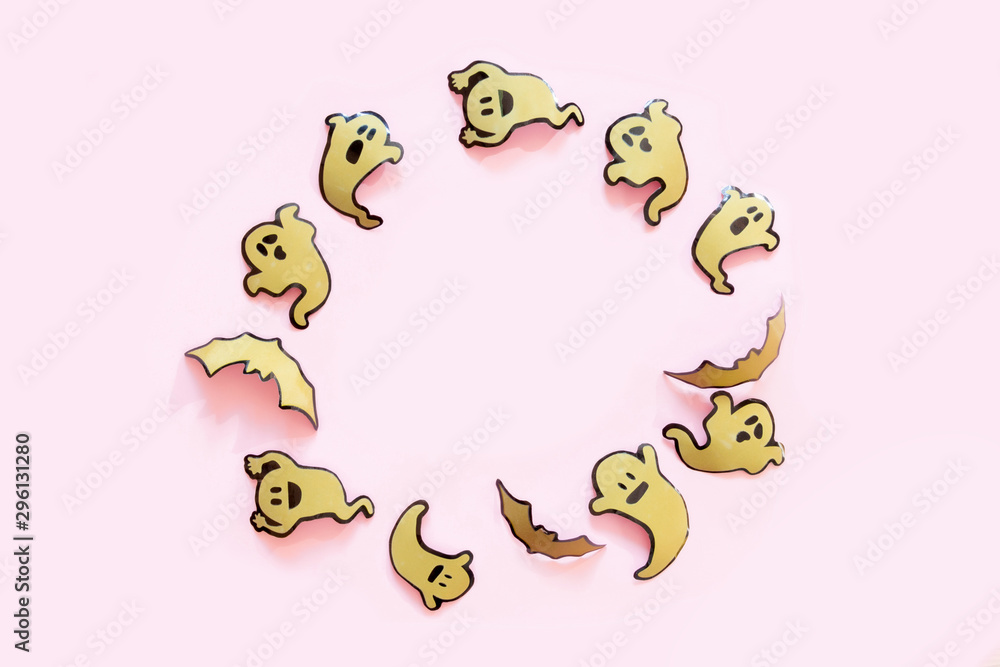 Happy halloween holiday concept. Halloween decorations, pumpkins, bats, candy, ghosts, bugs on pink background. Halloween party greeting card mockup with copy space. Flat lay, top view, overhead. Happy halloween holiday concept. Halloween decorations, pumpkins, bats, candy, ghosts, bugs on pink background. Halloween party greeting card mockup with copy space. Flat lay, top view, overhead.