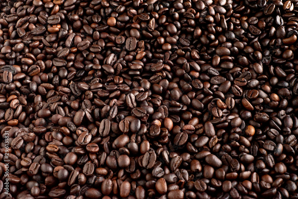 Roasted coffee beans background, arabica and robusta. Roasted coffee beans background, arabica and robusta.