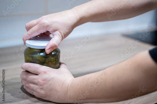 Pickled cucumbers, gherkins, dill, vegetable, food photography, unscrew lid