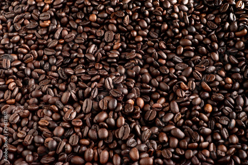 Roasted coffee beans background  arabica and robusta.