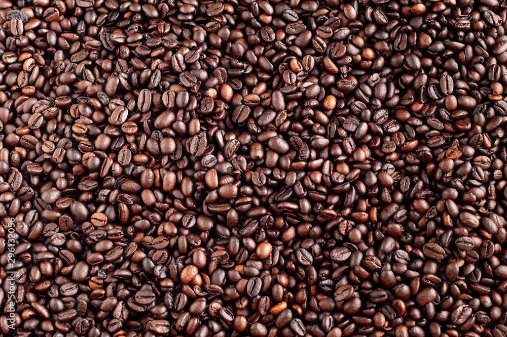 Roasted coffee beans background, arabica and robusta. Roasted coffee beans background, arabica and robusta.