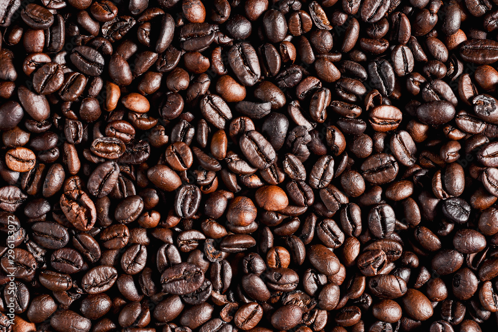 Roasted coffee beans background, arabica and robusta. Roasted coffee beans background, arabica and robusta.