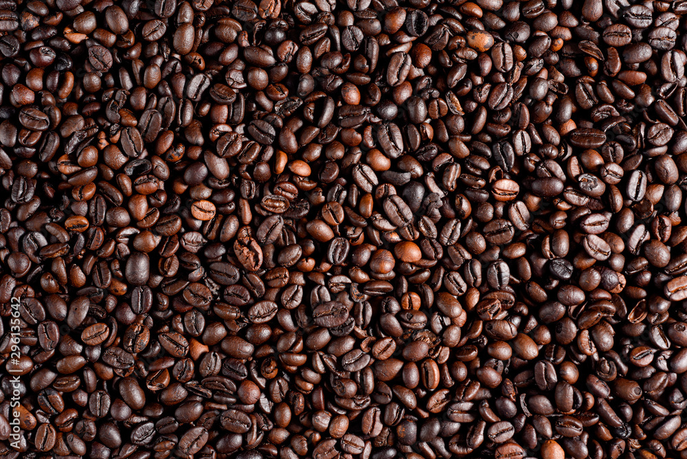 Roasted coffee beans background, arabica and robusta. Roasted coffee beans background, arabica and robusta.