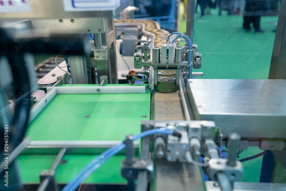 conveyor for the production of cans in factory. closed tin cans - Canned foods industry. conveyor for the production of cans in factory. closed tin cans - Canned foods industry.