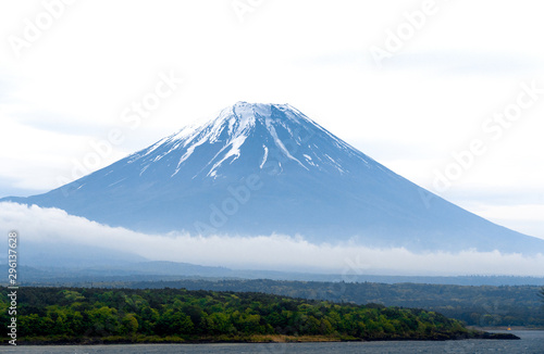 Close up Fuji with cloudy hat on top   vertical  with amazing clouds on blue sky background  beautiful in morning time in Fujinomiya  Shizuoka  Japan